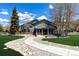 Stunning exterior of building with manicured lawn and rock-lined pathway at 85 Revett Dr # 66, Breckenridge, CO 80424