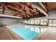 Spacious indoor pool with high ceilings and ample natural light at 85 Revett Dr # 66, Breckenridge, CO 80424