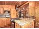 Kitchen featuring stainless steel appliances, lots of wooden cabinets, and granite countertops at 85 Revett Dr # 66, Breckenridge, CO 80424
