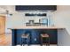 Kitchen with stainless steel appliances, butcher block counters and bar stool seating at 695 Manhattan Dr # 109, Boulder, CO 80303