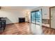 Cozy living room featuring a fireplace and a sliding door to the balcony at 695 Manhattan Dr # 109, Boulder, CO 80303