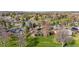 Expansive sight of houses and lush golf course creating a picturesque residential landscape at 16 Wedge Way, Littleton, CO 80123