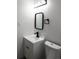 Bathroom with vanity, toilet and updated fixtures at 860 S Quivas St, Denver, CO 80223