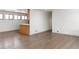 Spacious living room with hardwood floors and kitchen island at 860 S Quivas St, Denver, CO 80223