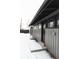 Black door with glass panes, steps leading to the door and snow on the ground at 860 S Quivas St, Denver, CO 80223