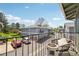 Cozy balcony with a seating area and a view of the parking area and well maintained community at 1272 S Uvalda St, Aurora, CO 80012