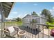 Balcony view with comfortable chair, fire pit, and view of the well maintained community at 1272 S Uvalda St, Aurora, CO 80012