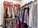 Walk-in closet with ample storage space, clothing racks, and shelves for organization at 4322 N Meadows Dr, Castle Rock, CO 80109