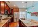Gourmet kitchen featuring stainless steel appliances and a breakfast bar at 4322 N Meadows Dr, Castle Rock, CO 80109
