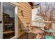 Cozy deck with patio furniture and sliding glass door access at 4322 N Meadows Dr, Castle Rock, CO 80109