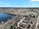 Aerial shot of townhomes by a lake with views of a golf course and open fields at 14585 W 32Nd Ave, Golden, CO 80401