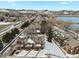 Aerial view of cozy townhomes in a neighborhood with scenic mountain and lake views at 14585 W 32Nd Ave, Golden, CO 80401