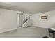 Spacious finished basement featuring neutral carpet and access to the upper level at 14585 W 32Nd Ave, Golden, CO 80401