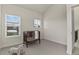 Cozy bedroom featuring neutral walls, two windows, and a dark wood crib with an elephant toy at 14585 W 32Nd Ave, Golden, CO 80401