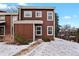 Charming two-story townhouse with a manicured lawn, offering a cozy and inviting appeal at 14585 W 32Nd Ave, Golden, CO 80401