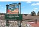 Applewood Golf Course sign featuring course information and a picturesque mountain landscape at 14585 W 32Nd Ave, Golden, CO 80401