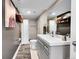 Contemporary bathroom with a sleek vanity, and a tiled walk-in shower at 2237 Zinnia St, Golden, CO 80401