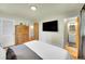 Inviting main bedroom showcasing wood floors, closet and an ensuite bathroom at 2237 Zinnia St, Golden, CO 80401