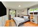 Serene main bedroom with hardwood floors, natural light, and stylish décor at 2237 Zinnia St, Golden, CO 80401
