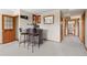 Basement area featuring a bar, stools and access to the other rooms in the basement at 11689 Caribou Dr, Franktown, CO 80116