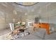 Unique bonus room inside of the silo, featuring an eating area and a foosball table for entertaining at 11689 Caribou Dr, Franktown, CO 80116