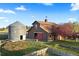 Charming barn and silo with a beautiful surrounding landscape at 11689 Caribou Dr, Franktown, CO 80116
