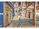 Entryway features hardwood floors, stairs, and large windows, providing an inviting space with lots of natural light at 11689 Caribou Dr, Franktown, CO 80116