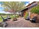 Cozy patio featuring a fire pit and comfortable seating arrangements at 11689 Caribou Dr, Franktown, CO 80116