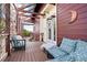 Inviting porch with comfortable seating and stylish decor at 11689 Caribou Dr, Franktown, CO 80116