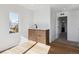 Hallway wet bar area with natural light and views of the exterior at 3432 W 25Th Ave, Denver, CO 80211