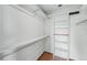 This closet features shelving and hanging rods that offer lots of room for storage at 2100 Bibles Hill Dr, Franktown, CO 80116