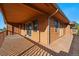 A spacious wood deck wraps around this home, perfect for outdoor entertaining and relaxation at 2100 Bibles Hill Dr, Franktown, CO 80116