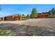 Two-story home with wood siding and lots of space between neighbors. The large lot has lots of potential at 2100 Bibles Hill Dr, Franktown, CO 80116