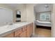 This bathroom features an attached bedroom and plenty of storage at 843 Snowberry St, Longmont, CO 80503