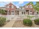 Charming townhome with a white picket fence and well-maintained landscaping in a desirable neighborhood at 843 Snowberry St, Longmont, CO 80503