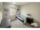 Charming bedroom with soft natural light, quaint decor, and plush carpet at 5290 Silver Hare Ct, Castle Rock, CO 80104