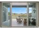 Relaxing outdoor deck area with comfortable seating and scenic neighborhood views at 5290 Silver Hare Ct, Castle Rock, CO 80104