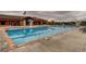 Community pool featuring clear blue water and ample seating at 5290 Silver Hare Ct, Castle Rock, CO 80104