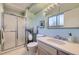 Fresh bathroom features a shower, toilet, and vanity with modern fixtures at 7380 Tabor St, Arvada, CO 80005