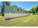 Expansive green backyard with white fence, ideal for outdoor activities, offering privacy and open space at 1711 Cato Cir # 21, Lafayette, CO 80026
