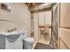 A basic unfinished bathroom with a sink, toilet, and shower featuring neutral tones and essential fixtures at 1711 Cato Cir # 21, Lafayette, CO 80026