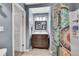Bathroom featuring a wood vanity, framed mirror, and a shower-tub combination with a patterned curtain at 1711 Cato Cir # 21, Lafayette, CO 80026