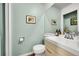 Fresh powder room features a sleek vanity, modern fixtures, and stylish decor at 1711 Cato Cir # 21, Lafayette, CO 80026