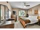 Bedroom with ceiling fan, neutral walls, carpet, a window and various antique wooden furnishings at 1711 Cato Cir # 21, Lafayette, CO 80026