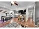 Spacious living room with hardwood floors, open to the kitchen, and featuring a modern design at 1711 Cato Cir # 21, Lafayette, CO 80026