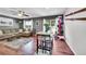 Open living area features a dining table, comfortable sectional, and sliding glass door access to outside at 1711 Cato Cir # 21, Lafayette, CO 80026