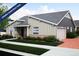 Craftsman style home with gray siding, red door, and two-car garage at 21925 E 51St St, Aurora, CO 80019