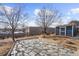 Backyard with stone patio and storage shed at 3124 W 9Th Avenue Pl, Broomfield, CO 80020