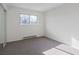 Simple bedroom with window and neutral walls at 3124 W 9Th Avenue Pl, Broomfield, CO 80020