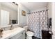 Clean bathroom with shower, toilet and vanity at 17725 E 99Th Ave, Commerce City, CO 80022